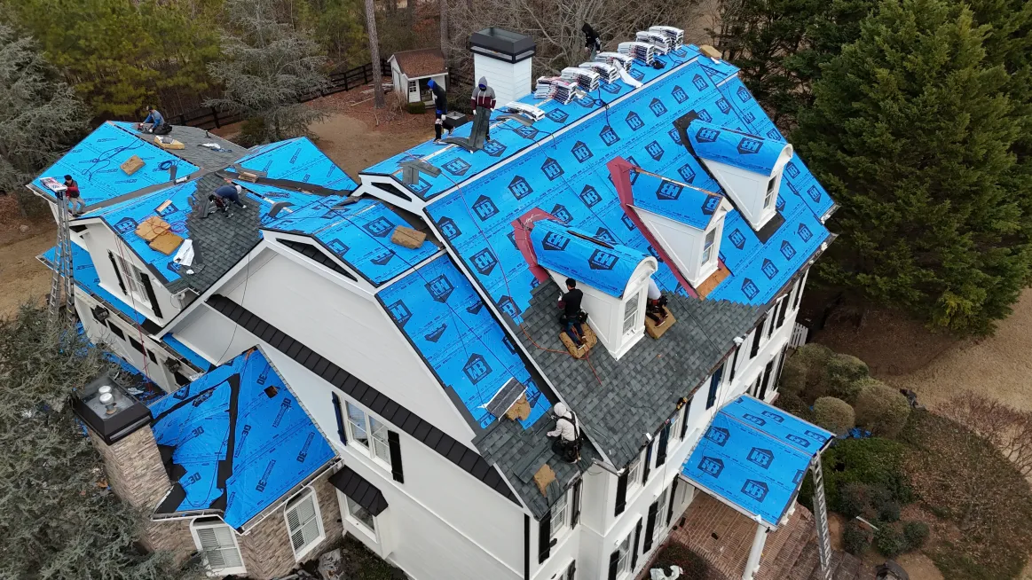 Roof Repair in Progress for Multi Story Home